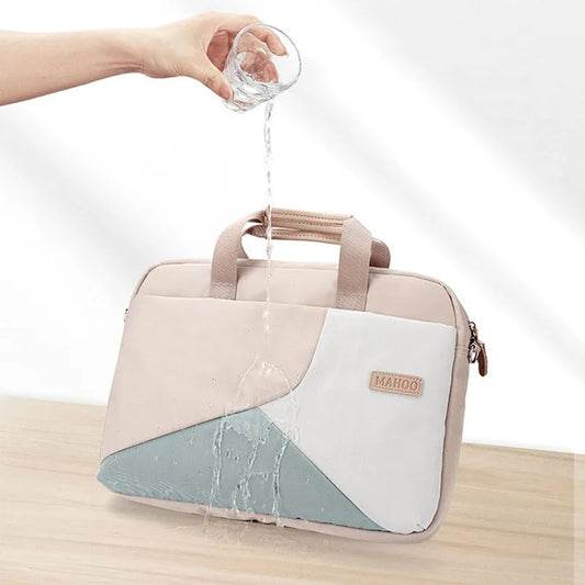 Khaki laptop sleeve bag with shoulder strap and zip; teal bottom corner detail