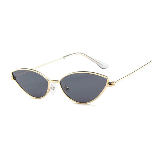 Cat-eye sunglasses with dark gray lenses and gold-tone metal frame