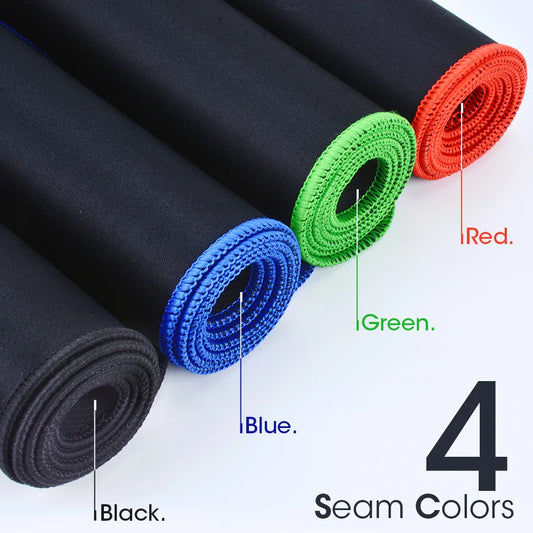 Rolled gaming mouse pads with smooth cloth tops and stitched borders; black, blue, green, red.