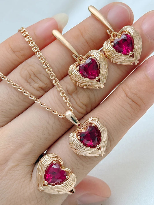 Rose gold heart-shaped gemstone jewelry set featuring a ring, necklace chain, and matching earrings