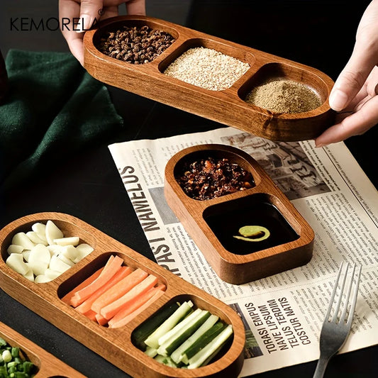 Wooden rectangular condiment tray with three square wells holding chopped vegetables