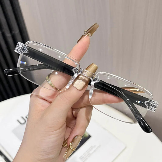 Adjustable reading glasses with clear lenses, black temple arms, and gold accents