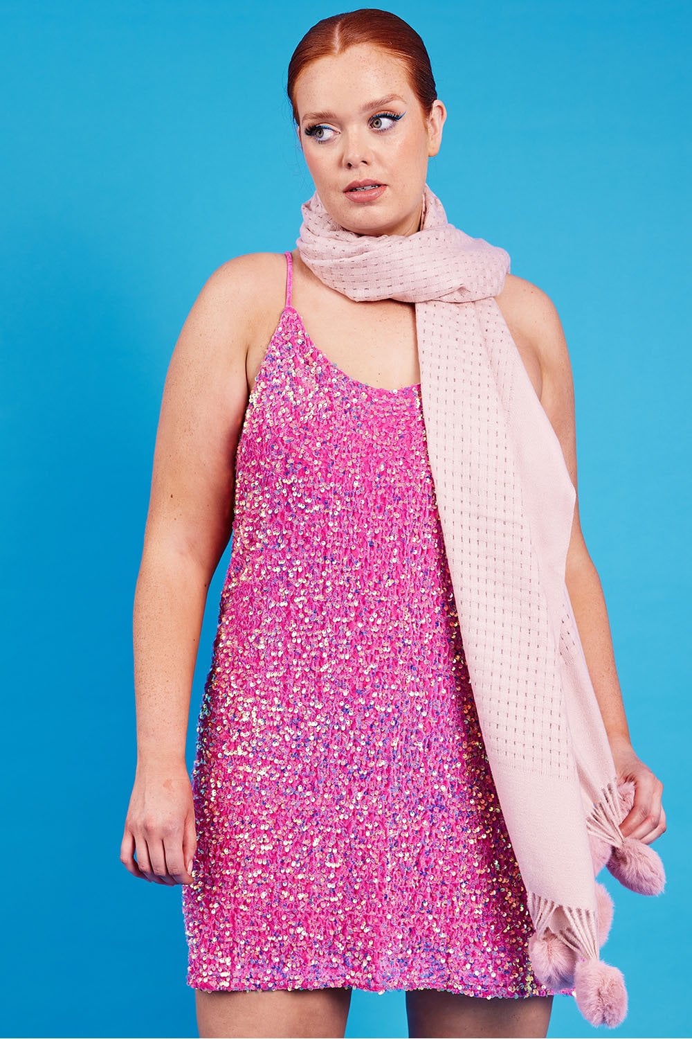Pink sequined cami dress with open neckline and draped ruffle scarf
