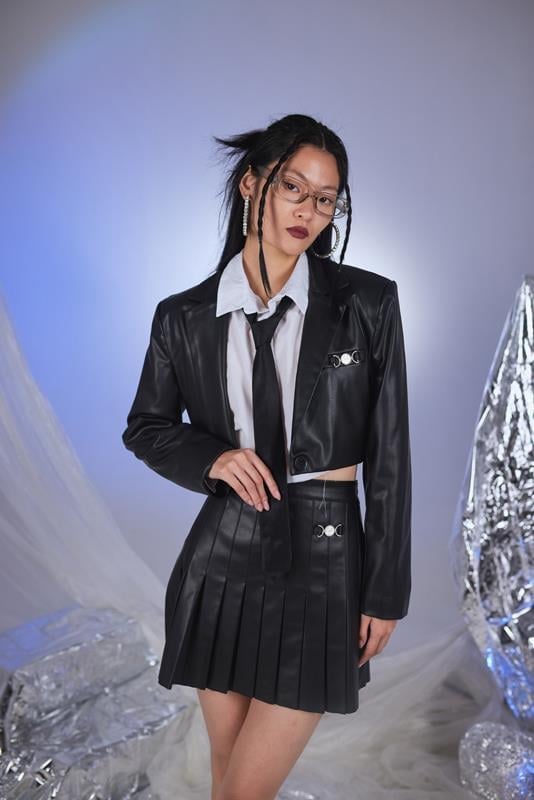 Black faux leather cropped jacket with notch lapels and front buttons
