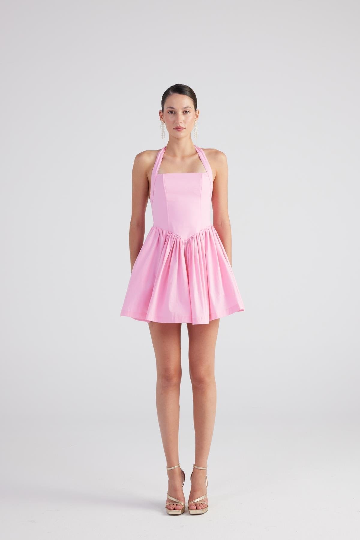 Pink halter mini dress with square neckline and gathered pleated skirt