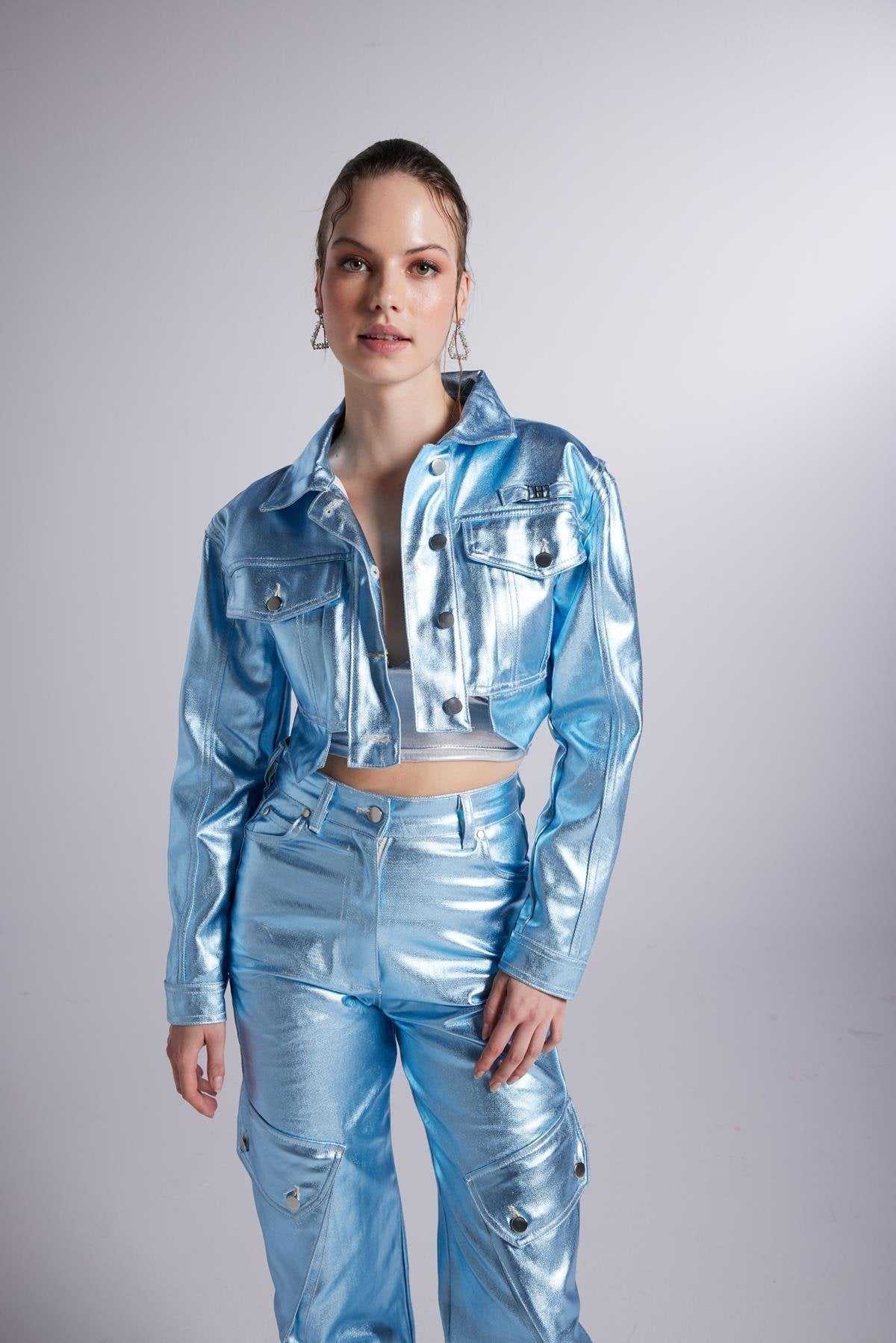 Metallic glossy blue cropped jacket, flap pockets, pointed collar, long sleeves