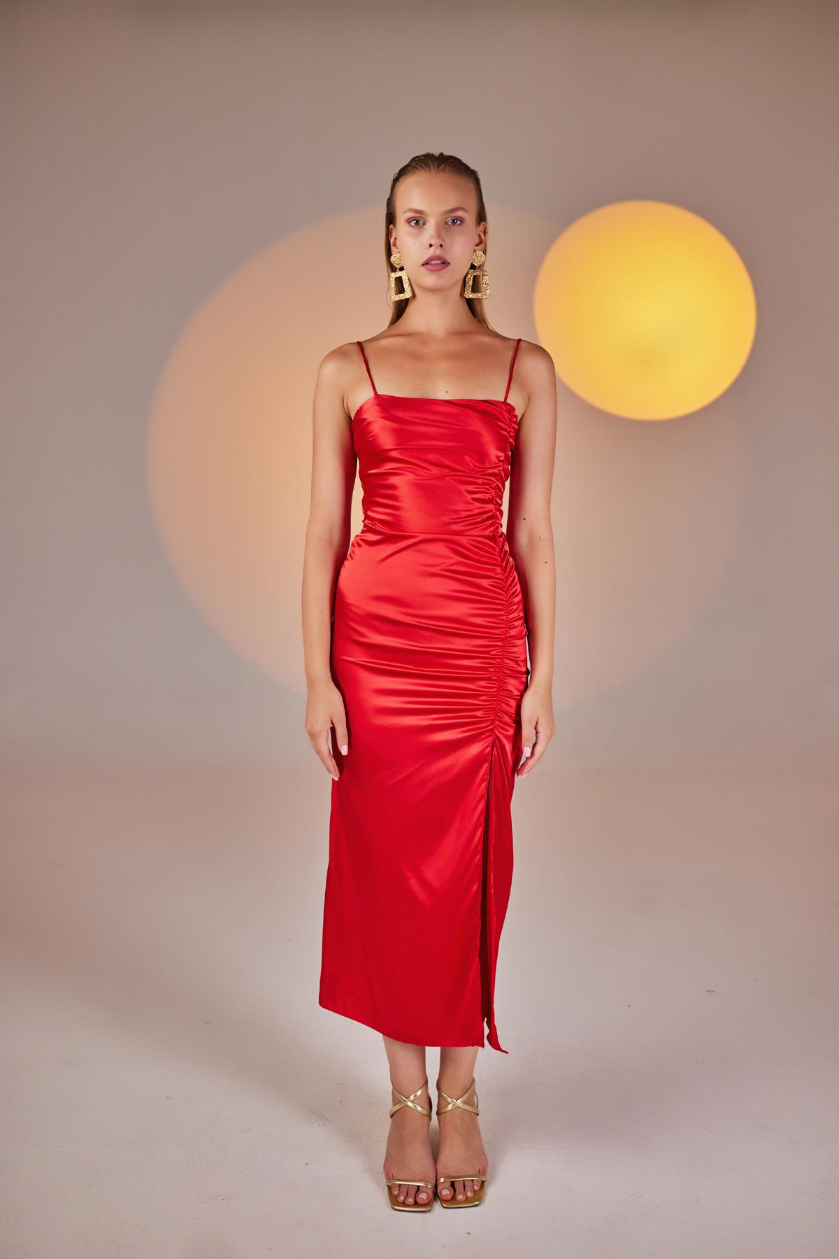 Red satin strappy midi dress with ruched front and long vertical slit