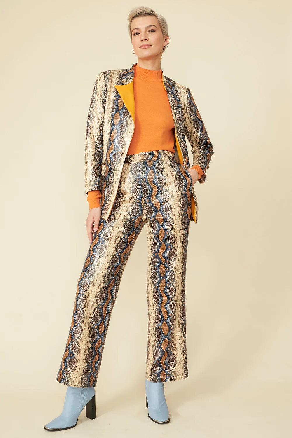 Snake print faux suede wide-leg trousers, blue and tan with dark pattern