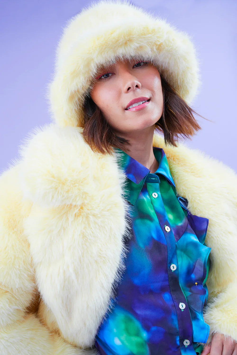 Yellow faux fur bucket hat, cozy fuzzy texture and wide brim