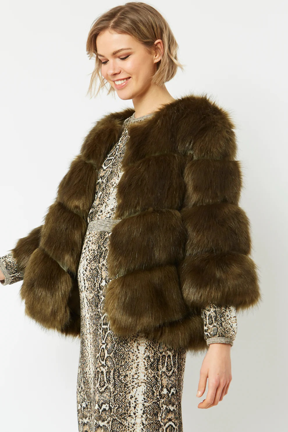 Dark green faux fur cropped coat with wide sleeves, tiered panels, open front