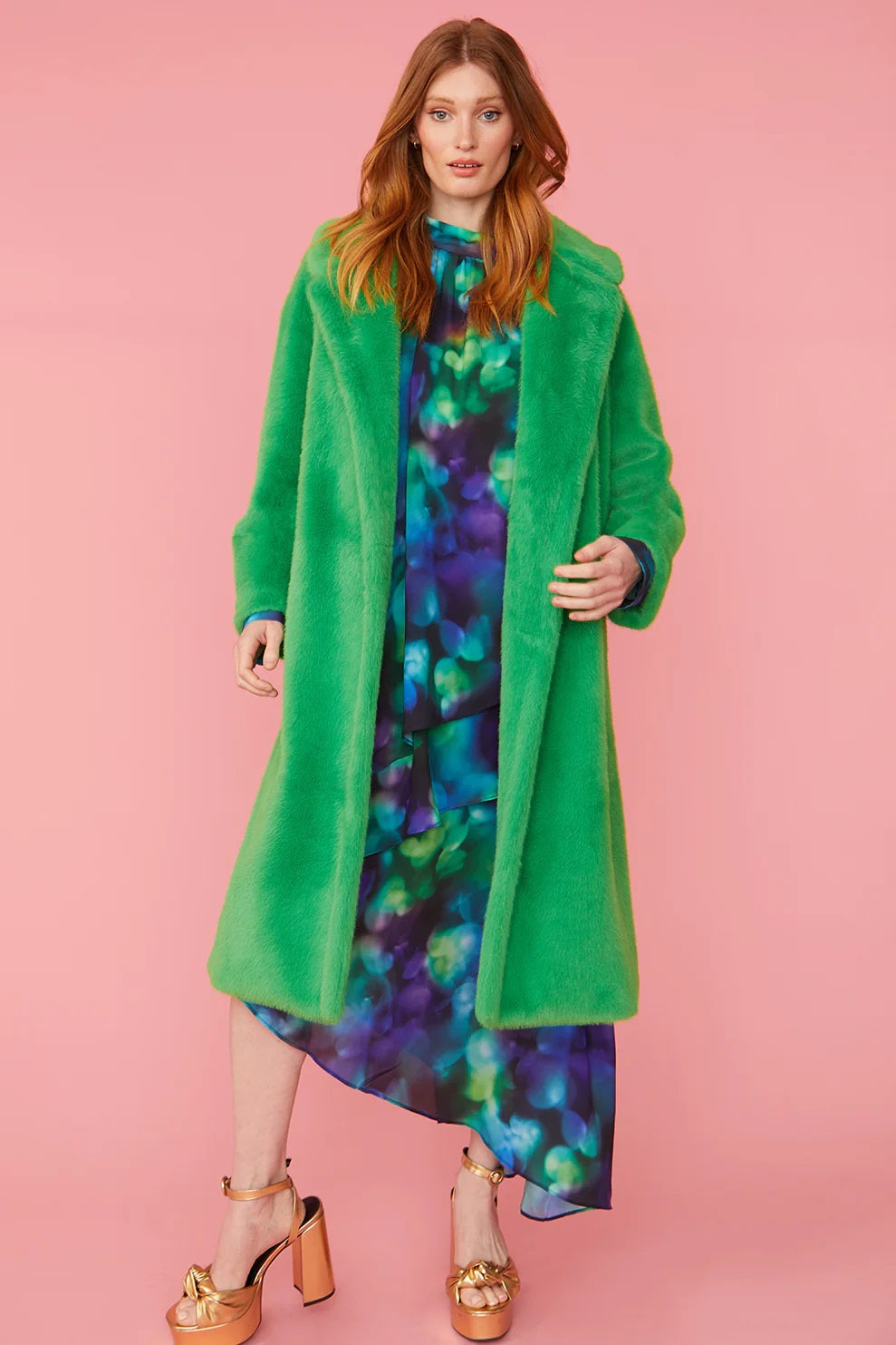 Green faux fur maxi coat with open front, wide sleeves, and hooded collar