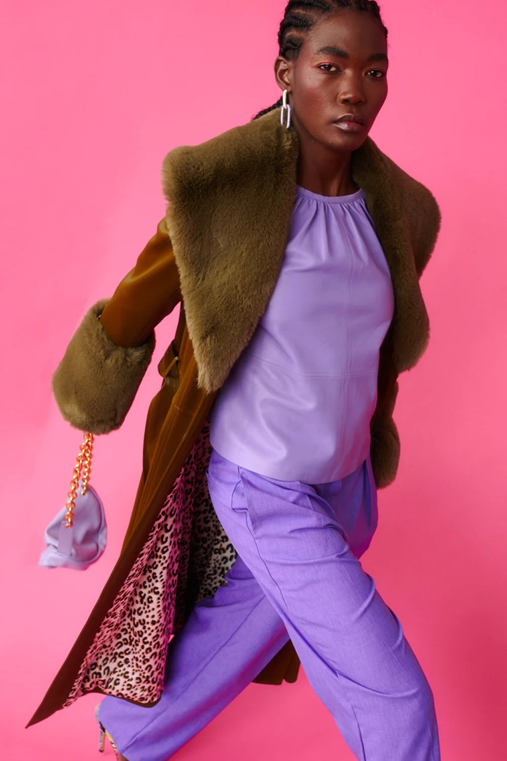 Green faux leather trench coat with faux fur collar and cuffs, side view