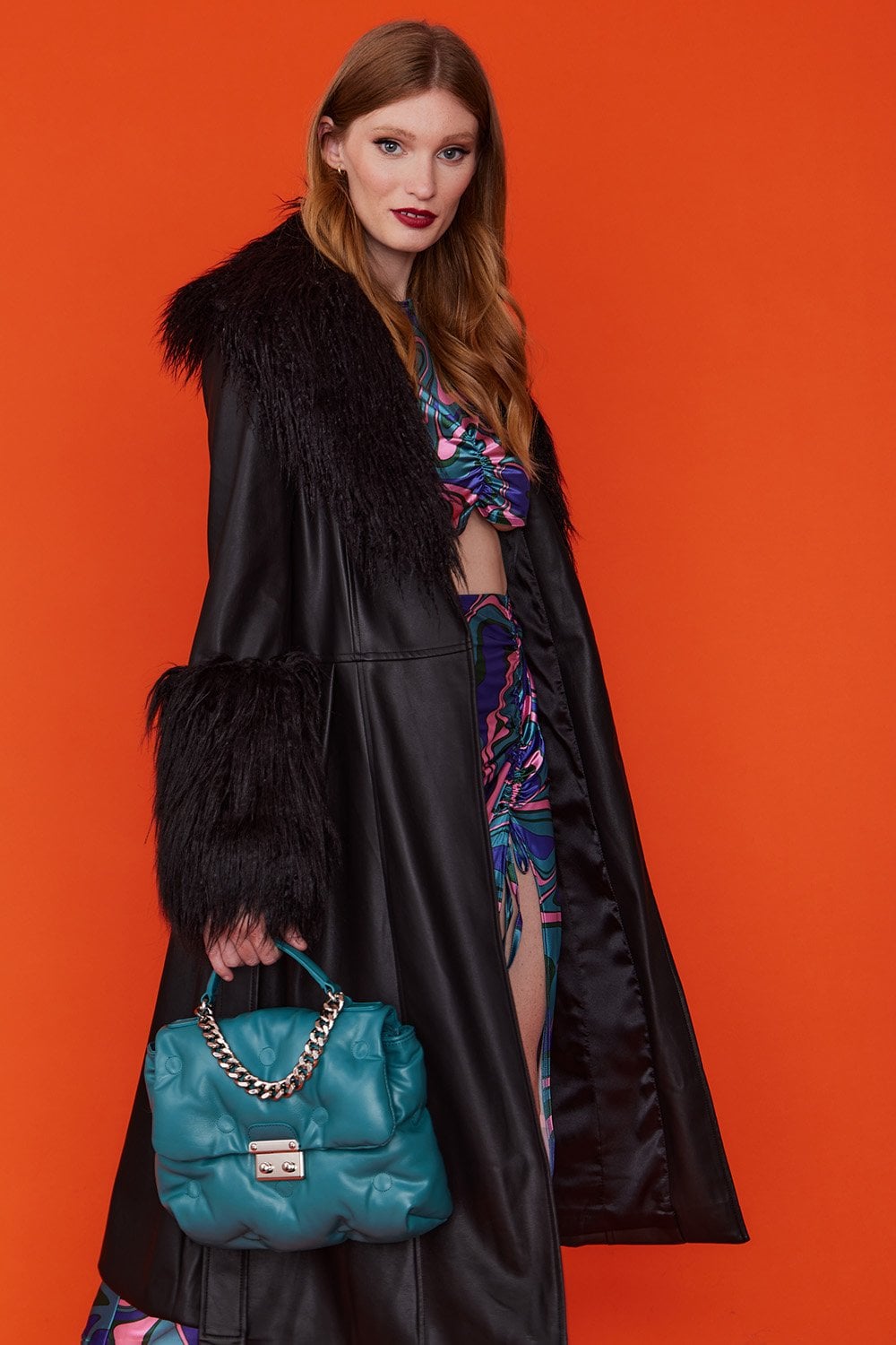 Turquoise faux leather satchel with chain strap and rectangular clasp