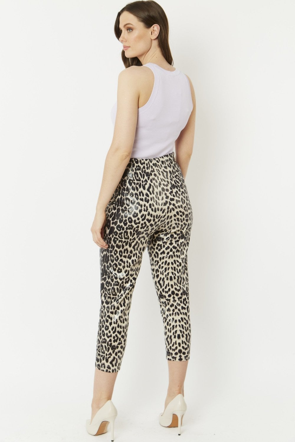 Grey faux suede leopard print trousers, side view, cropped ankle length