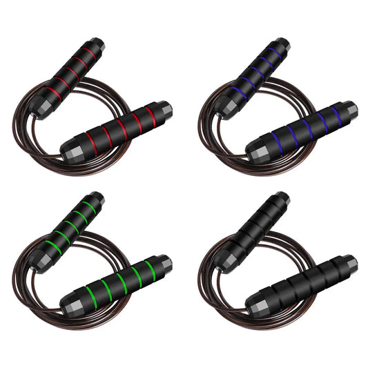 Jump rope set with black handles and coiled steel cable; red, blue, green, and black stripe grips