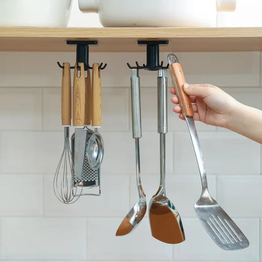 Rotating kitchen wall hook organizer with black mount and metal utensil hooks