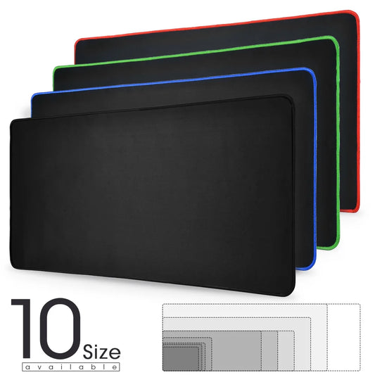 Large gaming mouse pad set with colored stitched edges in black, red, green, and blue.