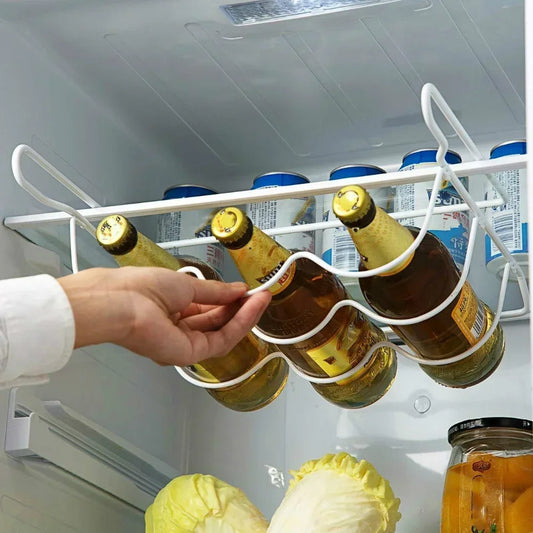 Refrigerator shelf bottle rack with white metal holder loops for beer or wine bottles.