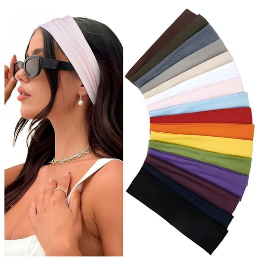 Elastic sports headband set for women, featuring black and light pink bands worn on model.