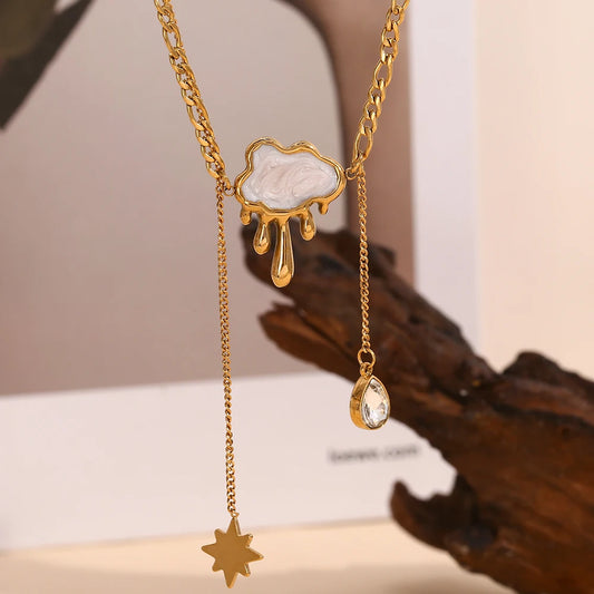 Gold double-layer cloud tassel necklace with star charm and teardrop crystal drop