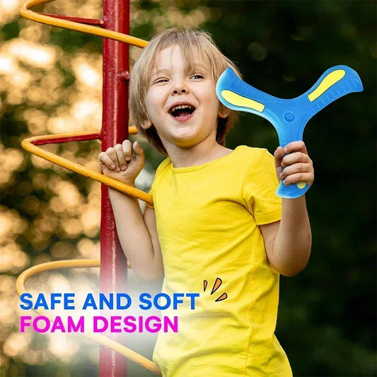 Child holding a blue three-leaf foam boomerang toy with yellow accents