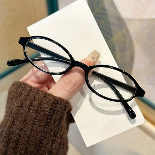 Small oval-square anti-blue-light eyeglasses, black frame with clear lenses