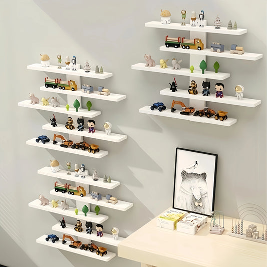 White wall-mounted display shelf with multi-tier ledges for dolls and small collectibles