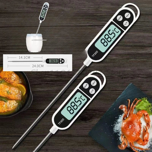 Digital food thermometer with LCD display, white body, and long stainless steel probe.