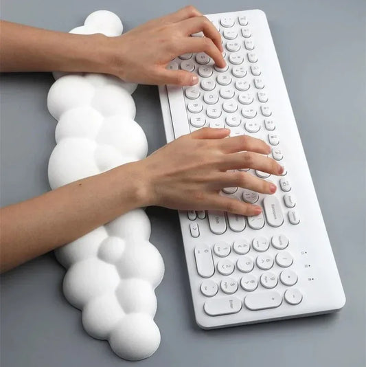 White cloud-shaped wrist rest pad for keyboard, contoured cushion support