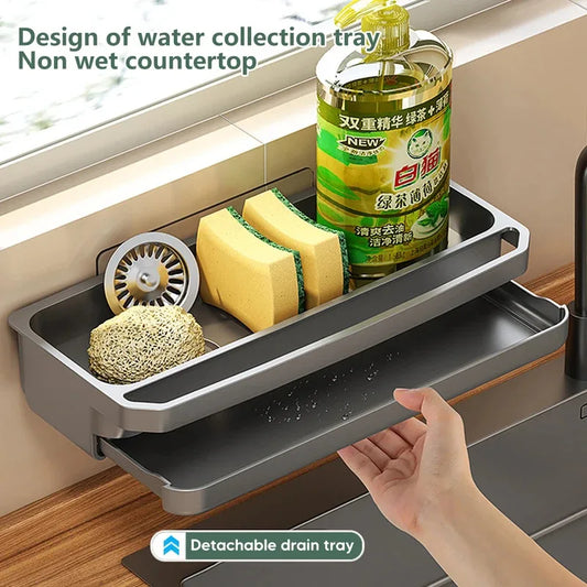 Gray wall-mounted sink sponge holder drain shelf with raised edges and open slot