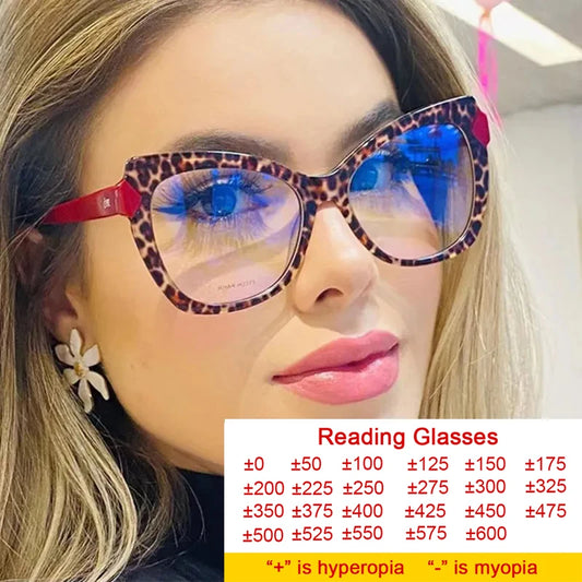 Oversized cat-eye reading glasses with leopard pattern and blue tinted lenses