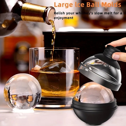 Large silicone ice ball mold with funnel lid, pouring amber drink into glasses