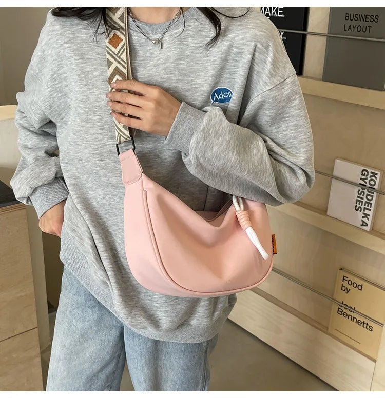 2026 New Fashion Crossbody Bag Simple Wide Shoulder Strap Design Single Shoulder Bag Original Style Commuting Dumpling Women Bag