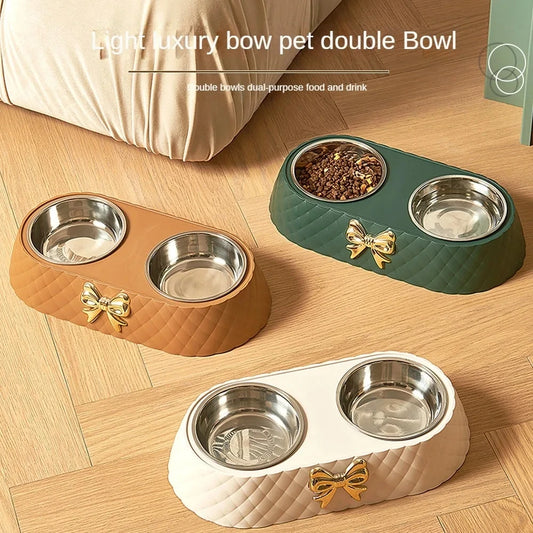 Green quilted double pet bowl with two stainless steel dishes and gold bow charm