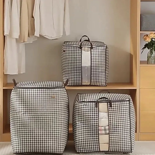 Houndstooth nonwoven storage cubes with handles and zippered fronts on shelves