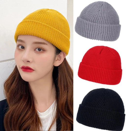 Knit beanie hats: mustard yellow, gray, red, and dark navy, cuffed rib knit