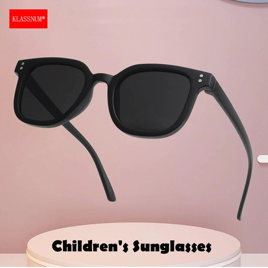 Black kids square sunglasses with dark lenses, angled side view