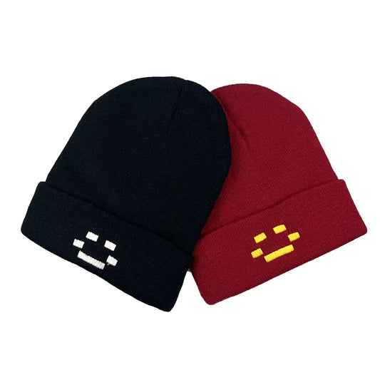 Black and burgundy beanies with pixel-face embroidery and fold-over cuffs