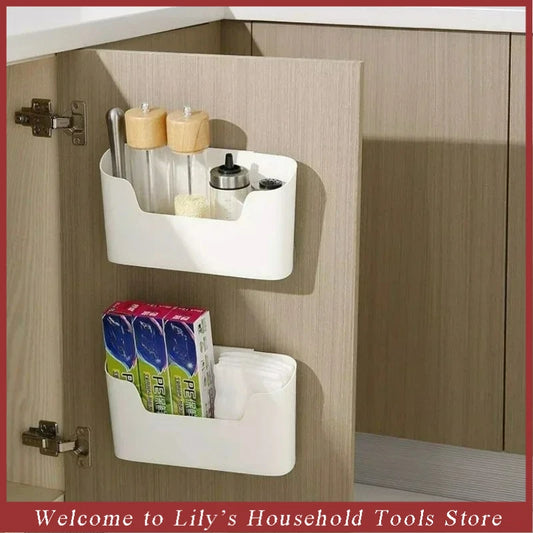 Wall-mounted adhesive storage rack with two compartments, holding small kitchen items