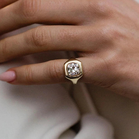 14k rose gold vintage moissanite ring with square white stone bezel setting