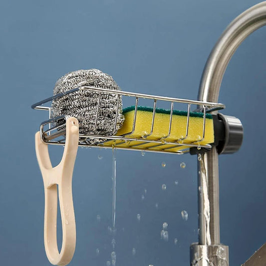 Chrome sink drain rack with scrub sponge and yellow soap sponge pads