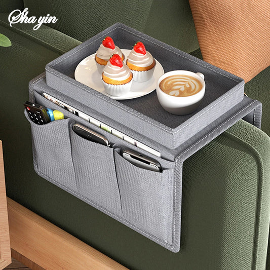 Light grey sofa armrest storage bag with top lid and two front pockets