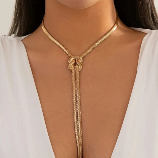 Gold twisted chunky chain long necklace with knot link centerpiece
