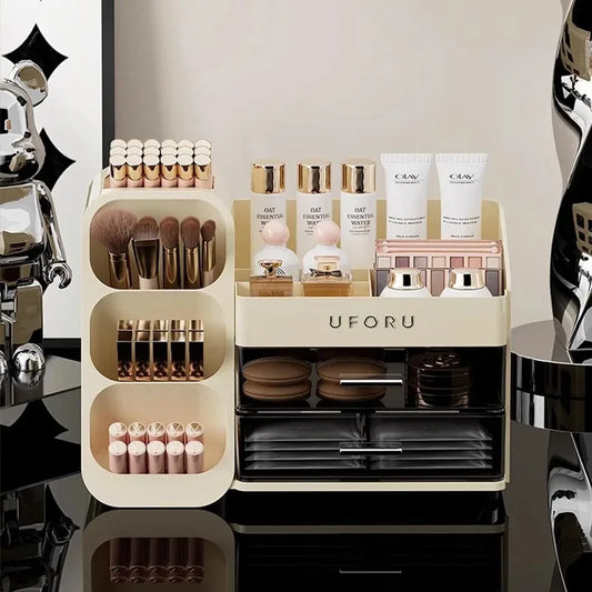 Cream white countertop makeup organizer with multiple sections and two clear storage drawers
