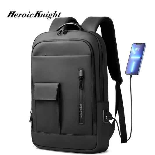 Black slim laptop backpack with front pocket, top handle, and padded shoulder straps