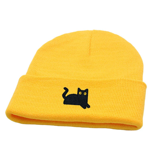 Yellow rib-knit beanie hat with embroidered black cat on front