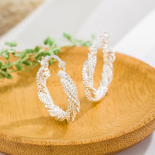 Sterling silver textured hoop earrings with dangling sparkle bead rows