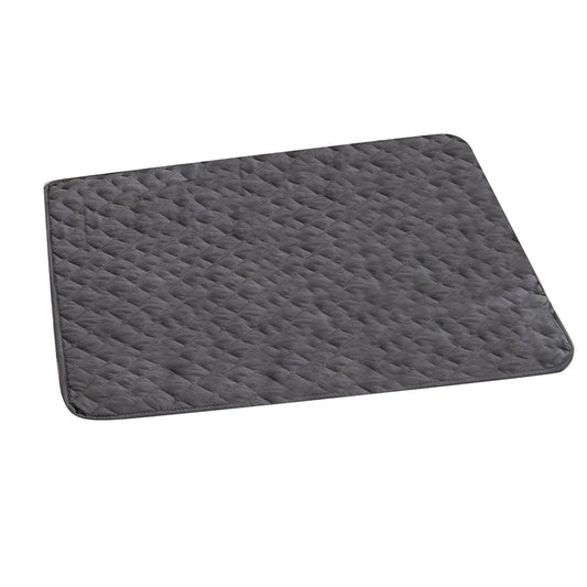 Dark gray quilted pet bed mat with stitched border and diamond-texture surface