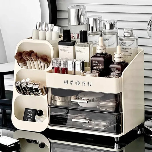 Cream white makeup organizer with clear drawers and compartments for brushes and bottles