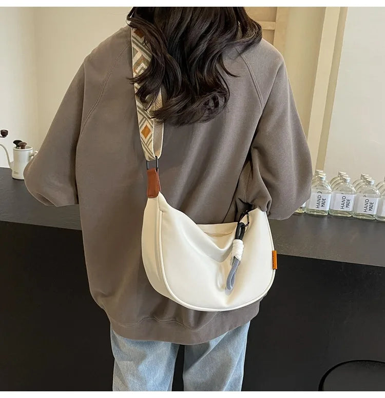 2026 New Fashion Crossbody Bag Simple Wide Shoulder Strap Design Single Shoulder Bag Original Style Commuting Dumpling Women Bag